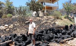Emekli itfaiyeci evini alevlerden kurtardı