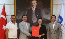 674. Elmalı Güreşleri için Büyükşehir ve Elmalı el ele