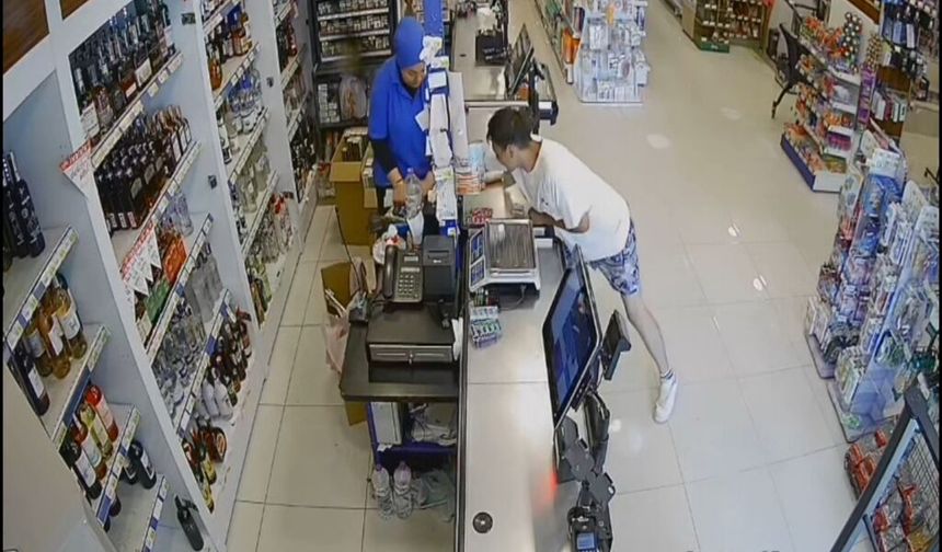 Marketten hırsızlık yapan şüpheli, içinde 10 yaşında çocuğun da bulunduğu otomobili gasbedip kaçtı